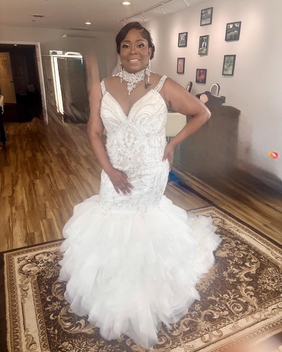Real bride in her handmade white beaded mermaid wedding dress with ruffled tulle skirt